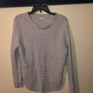 light blue sweater